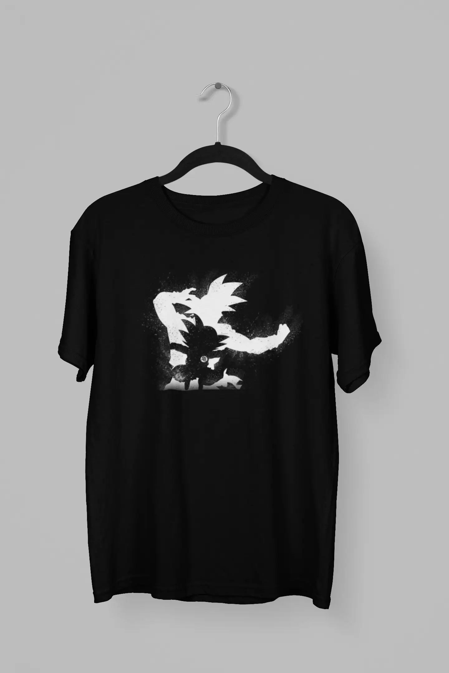 Remera con la silueta de Goku niño y adulto