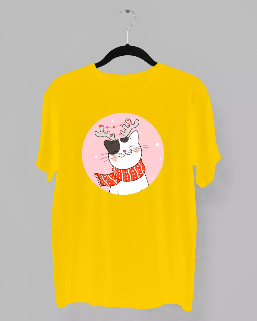 Remera navideña de un gatito con cuernos de reno