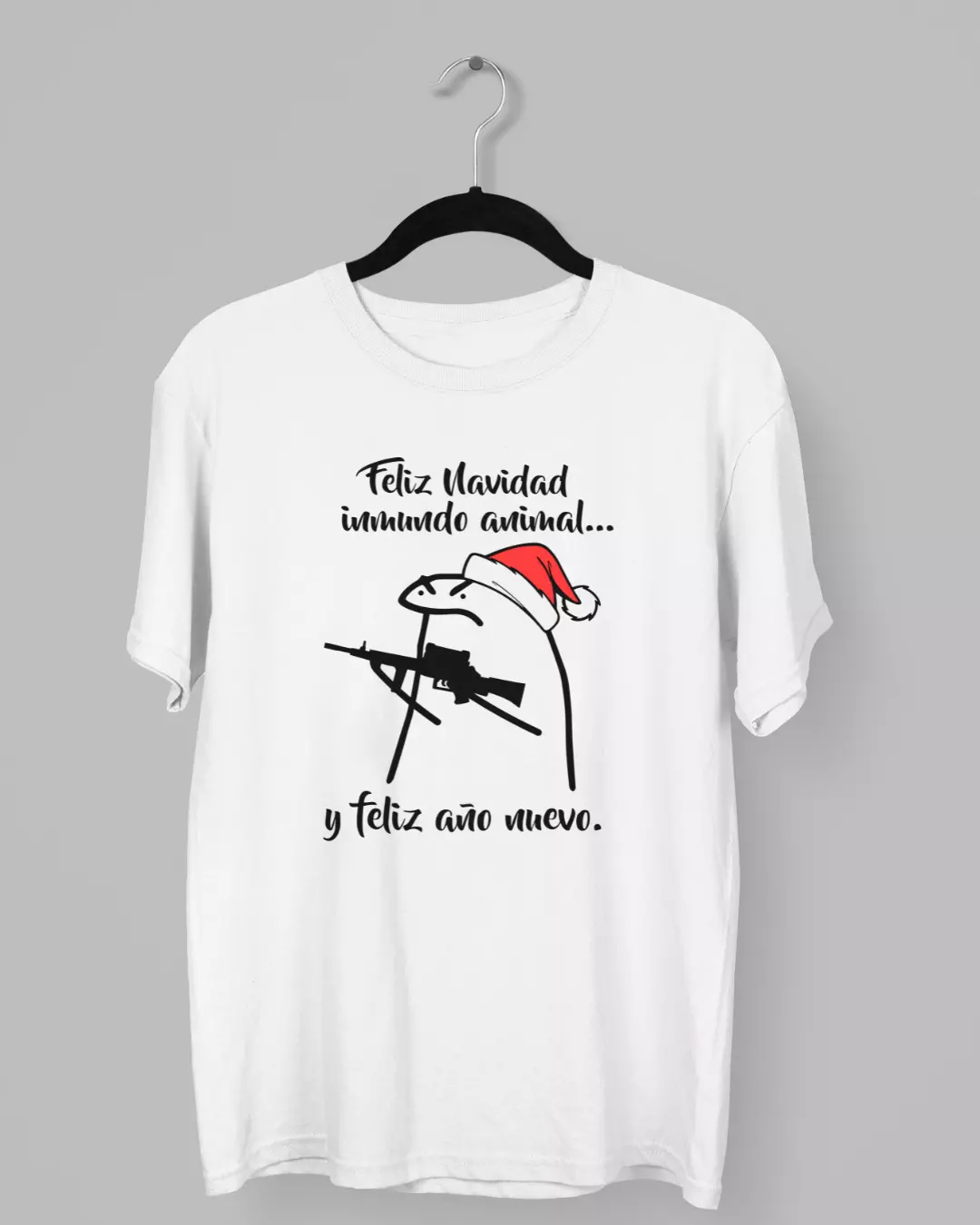 Remera con la frase Feliz Navidad Inmundo Animal y Flork con una ametralladora